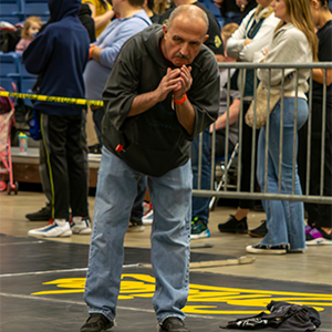 Smiling Coach Johnny Cook